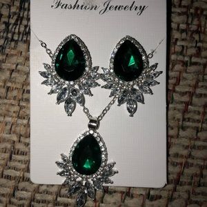 Earrings and a necklace also comes with a ring.